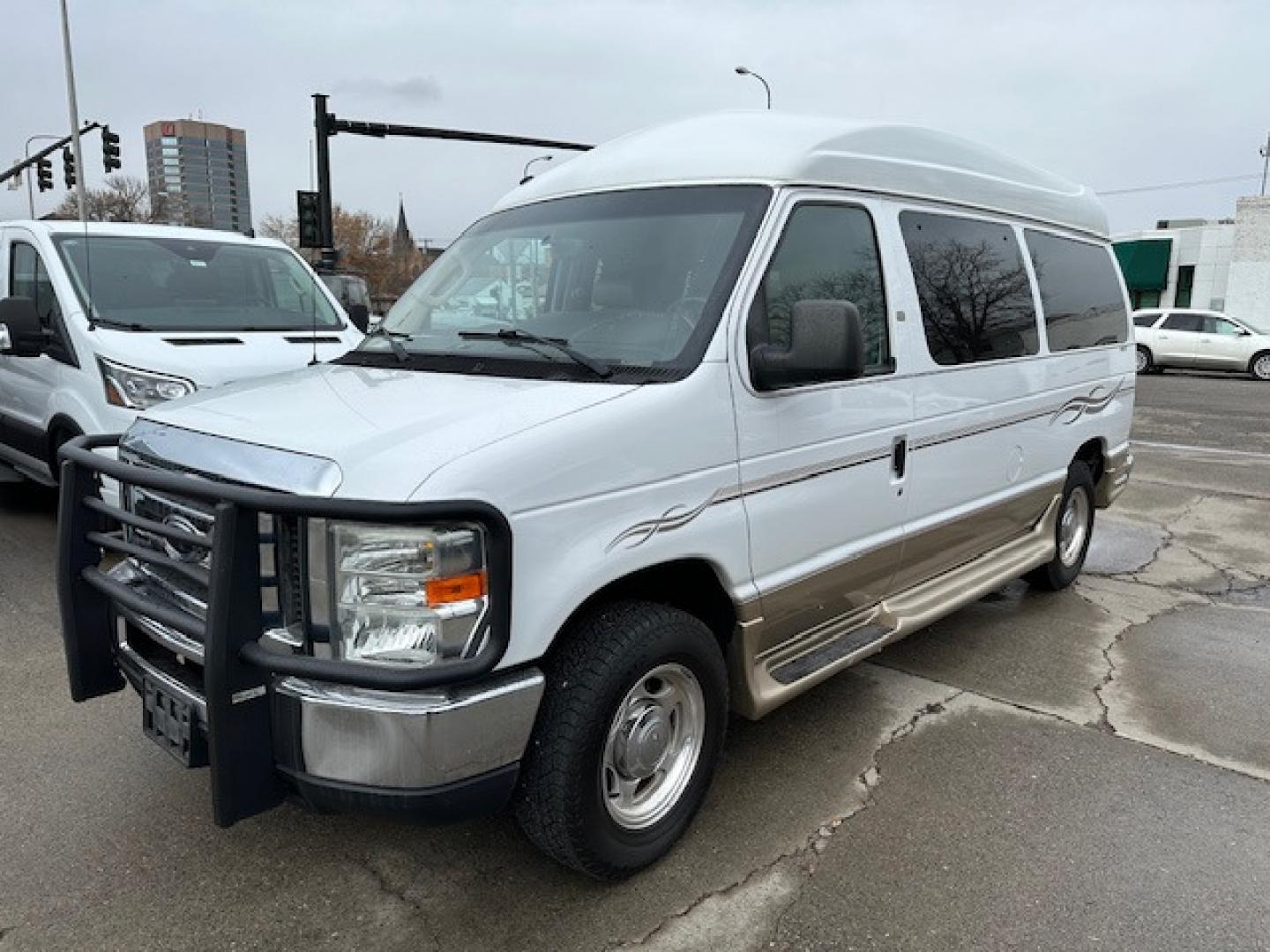 2017 White Ford E Series Van Tuscany Conversion with an 5.4 V8 engine, Automatic transmission, located at 3200 1st Avenue North, Billings, MT, 59101, (406) 245-9055, 45.779270, -108.510742 - Low Mileage, Handicap Accessible Custom Hi-Roof Van. Passenger Side Power Lift with Cargo Doors, 5.4 V8, Running Boards, Designed By Mobility Of Denver and Only 81,000 Miles. CarFax Dealer. Auto Brokers of Montana/AA&A Auto Rental/Fox Car Rental Billings - Photo#4